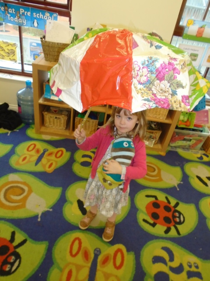 Fleet nursery children create their own umbrellas
